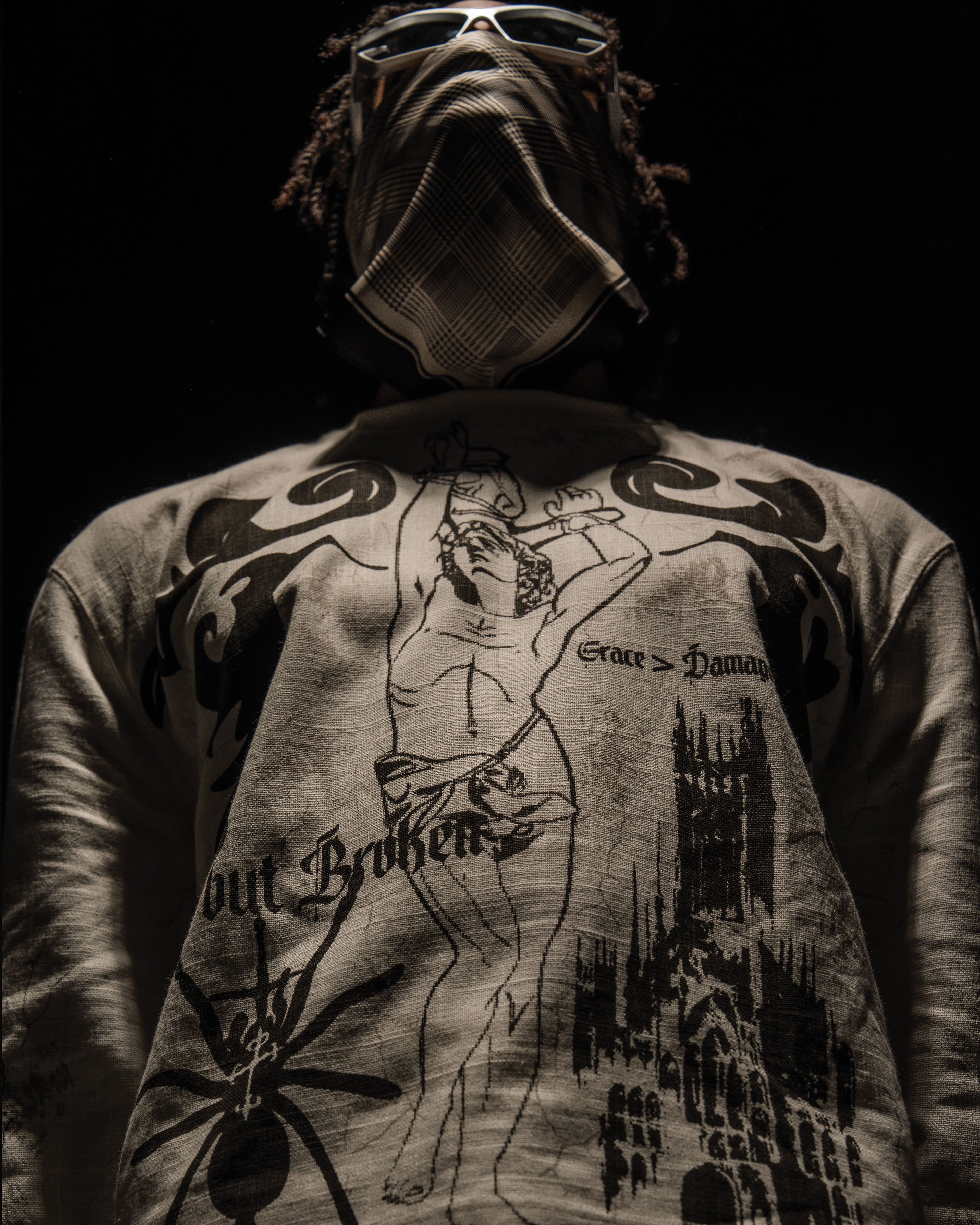 Avant-garde darkwear outfit styled with dramatic gothic streetwear aesthetics