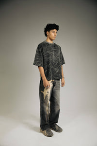 Modern oversized black acid-wash t-shirt for men, ideal for creating trendy streetwear looks