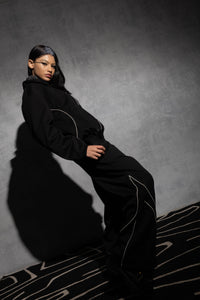 Black oversized men’s tracksuit with bold streetwear look