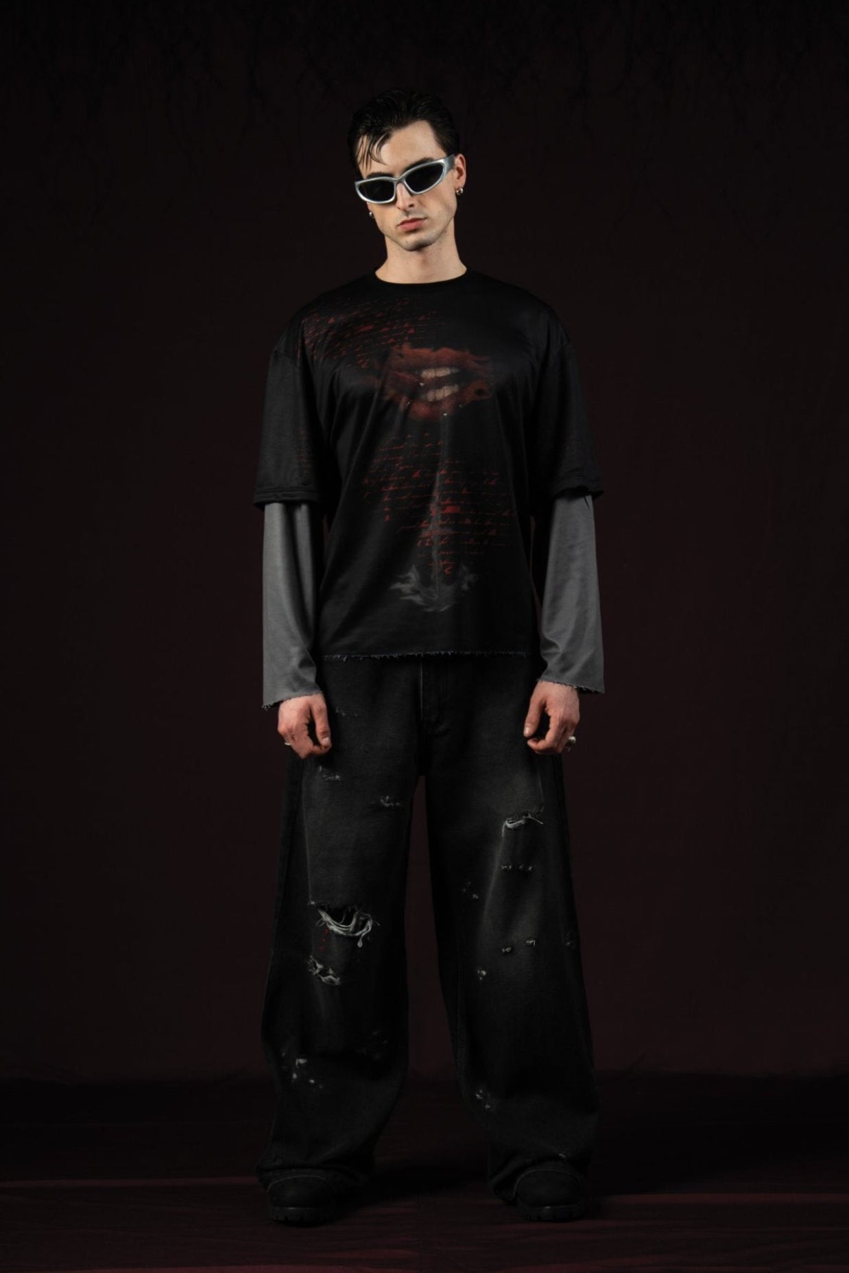 Zica Bella Bloodzic Jersey 01 black oversized streetwear jersey with red glitch graphic worn by male model portrait front view
