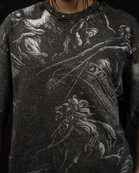 Detailed close-up of the vintage-inspired mythic artwork printed on a washed charcoal oversized t-shirt