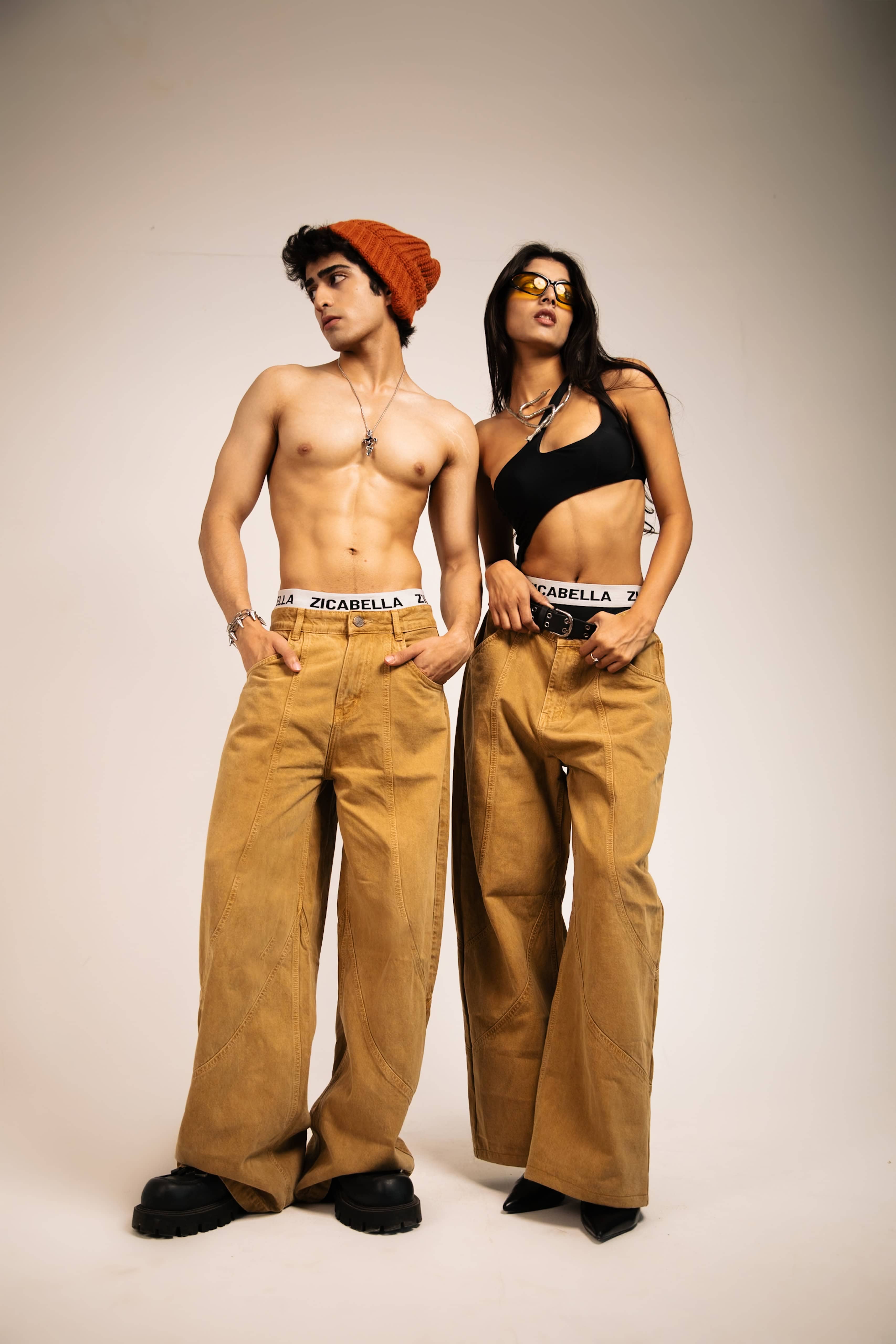 Trendy loose fit beige cotton jeans, designed for a streetwear look