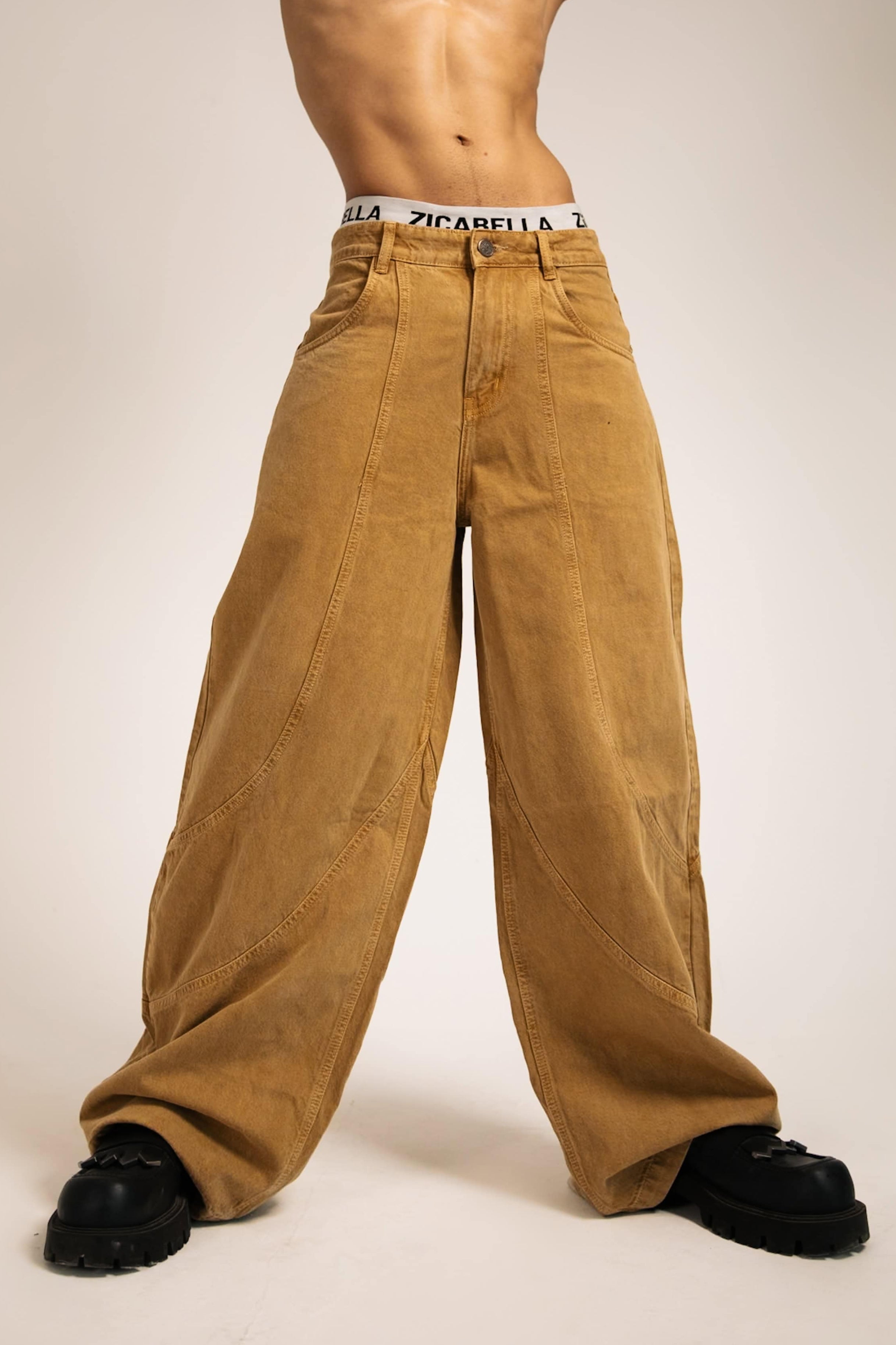 premium oversized beige cotton jeans, designed for a bold streetwear statement