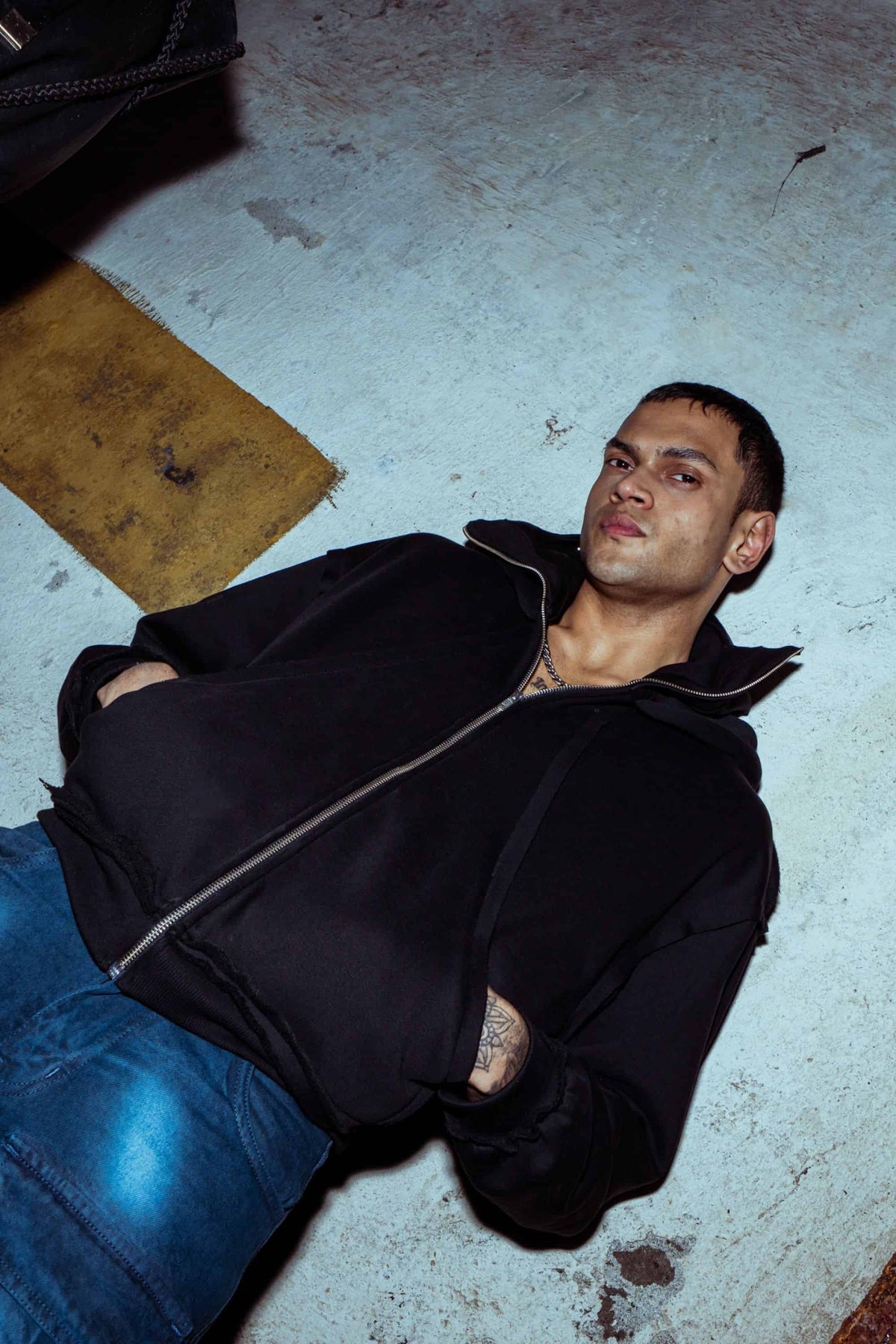 Designer black cotton jacket with a baggy fit and a bold oversized hood, exuding premium style