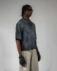 Side profile of DRYXEN oversized acid wash black streetwear tee