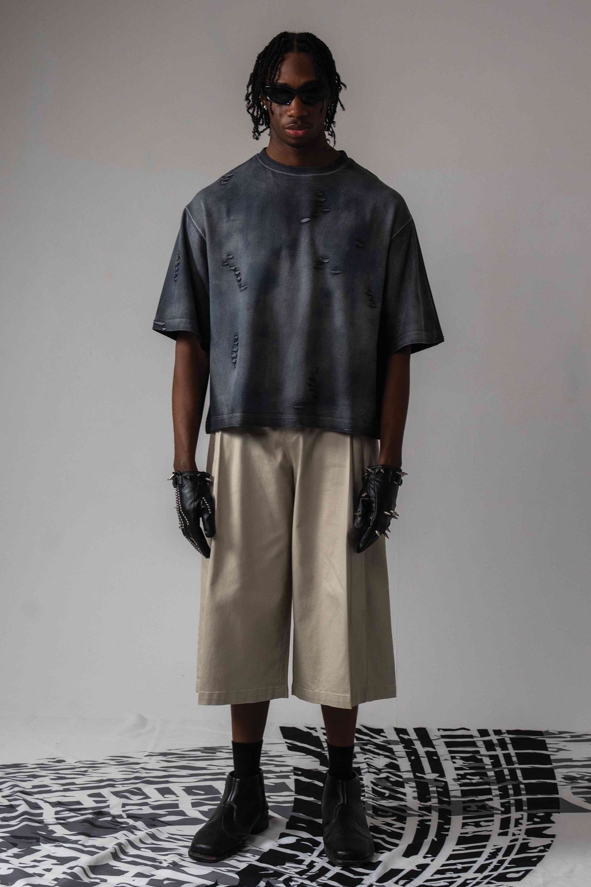 Front view of DRYXEN oversized distressed black acid wash streetwear t-shirt