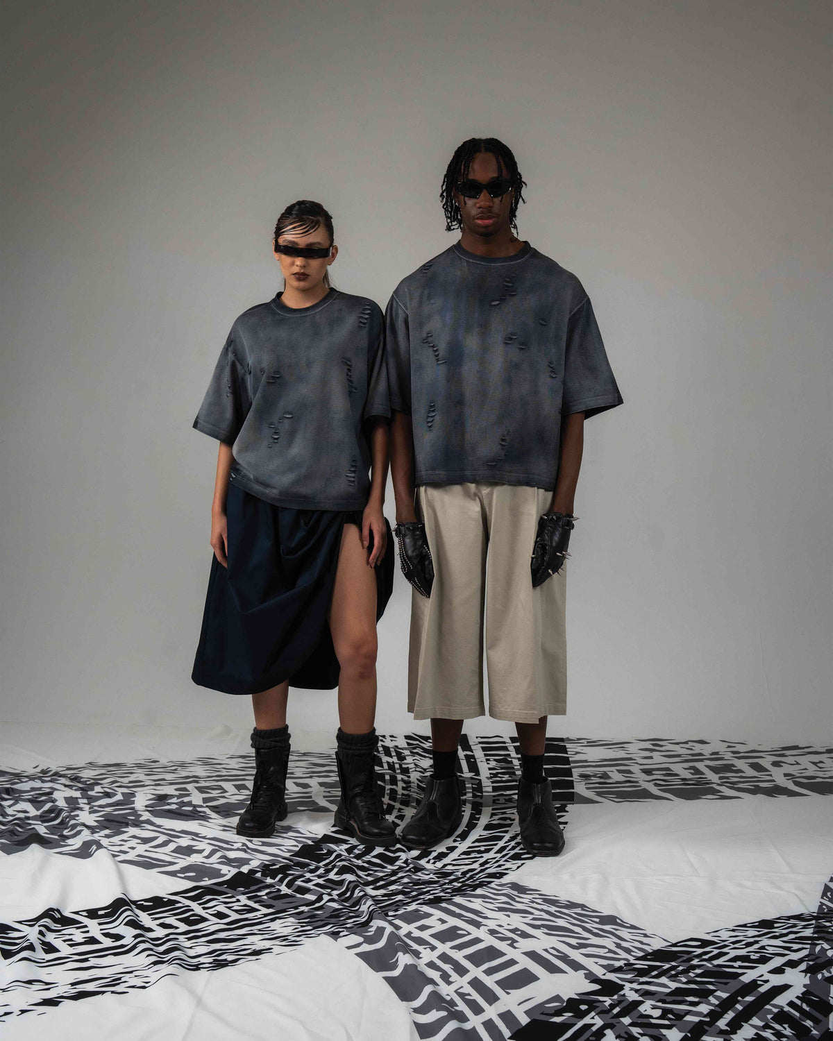 Full body editorial campaign shoot for DRYXEN oversized distressed black t-shirt