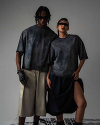 Matching streetwear outfits for men and women featuring oversized black tees