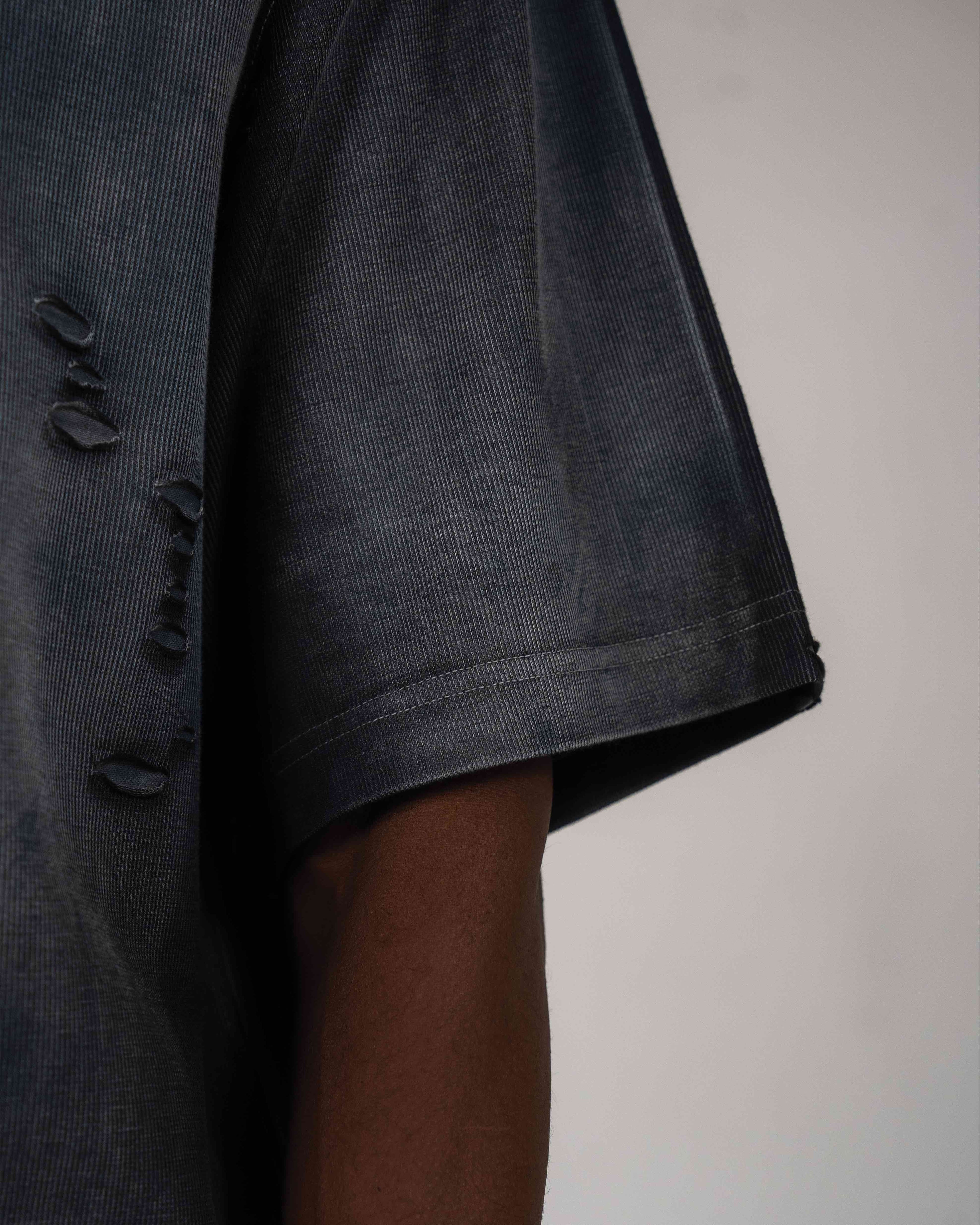 Premium heavy fabric close up with distressed ripped detailing