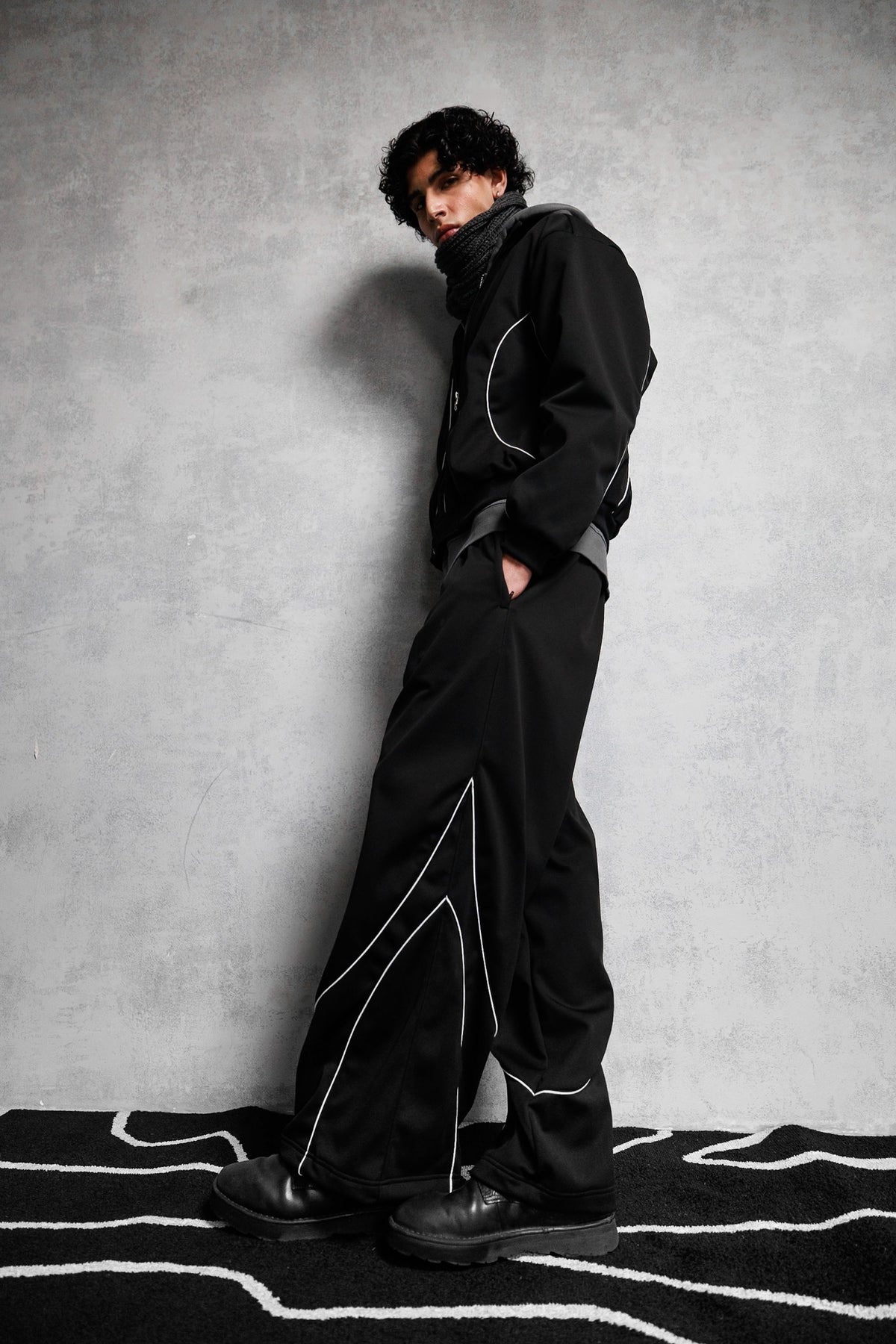 Full length view of black oversized men’s tracksuit