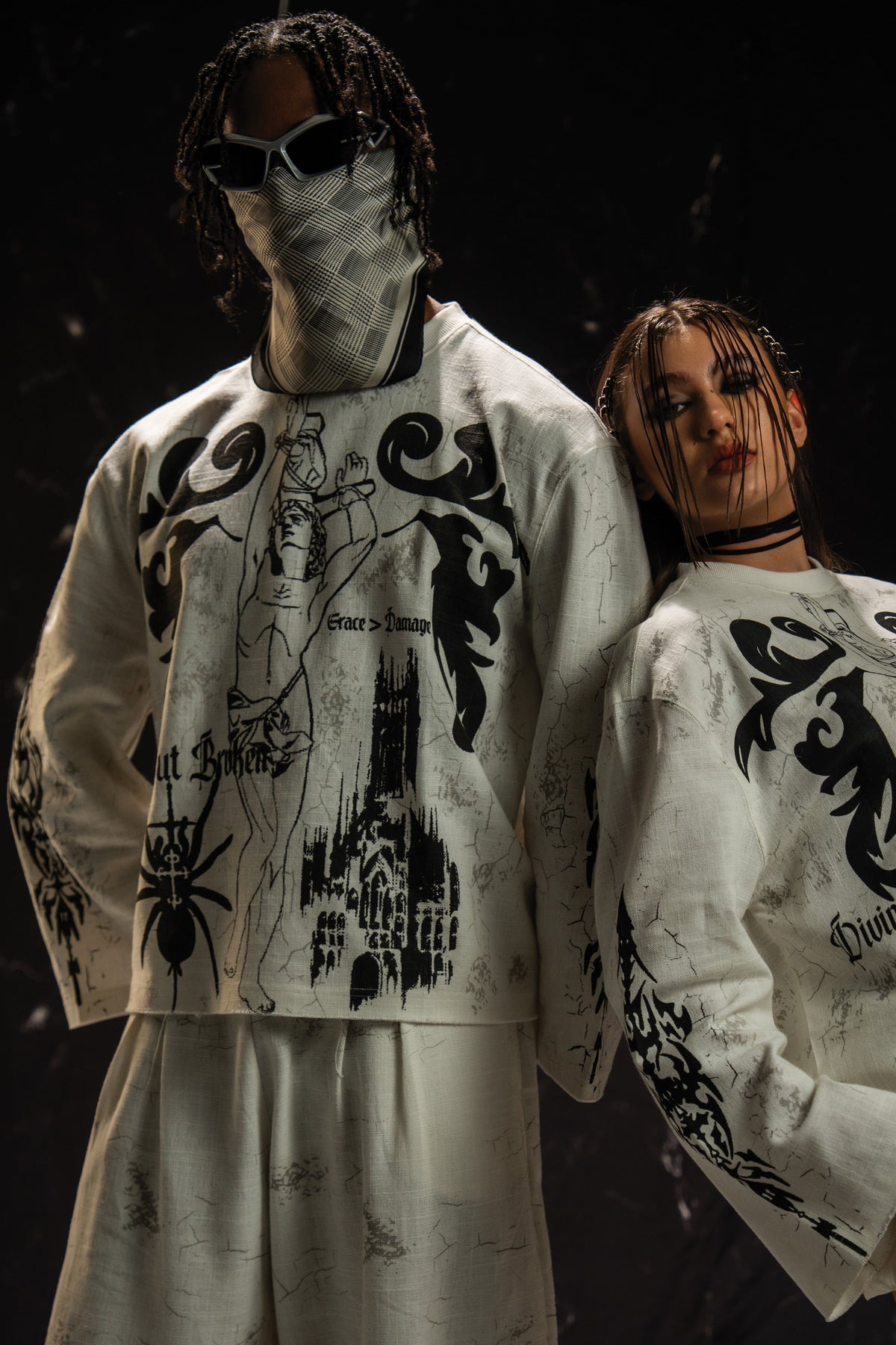 Front view of a gothic graphic long sleeve t-shirt with dark aesthetic artwork and relaxed fit styling