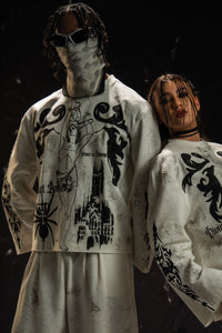 Front view of a gothic graphic long sleeve t-shirt with dark aesthetic artwork and relaxed fit styling