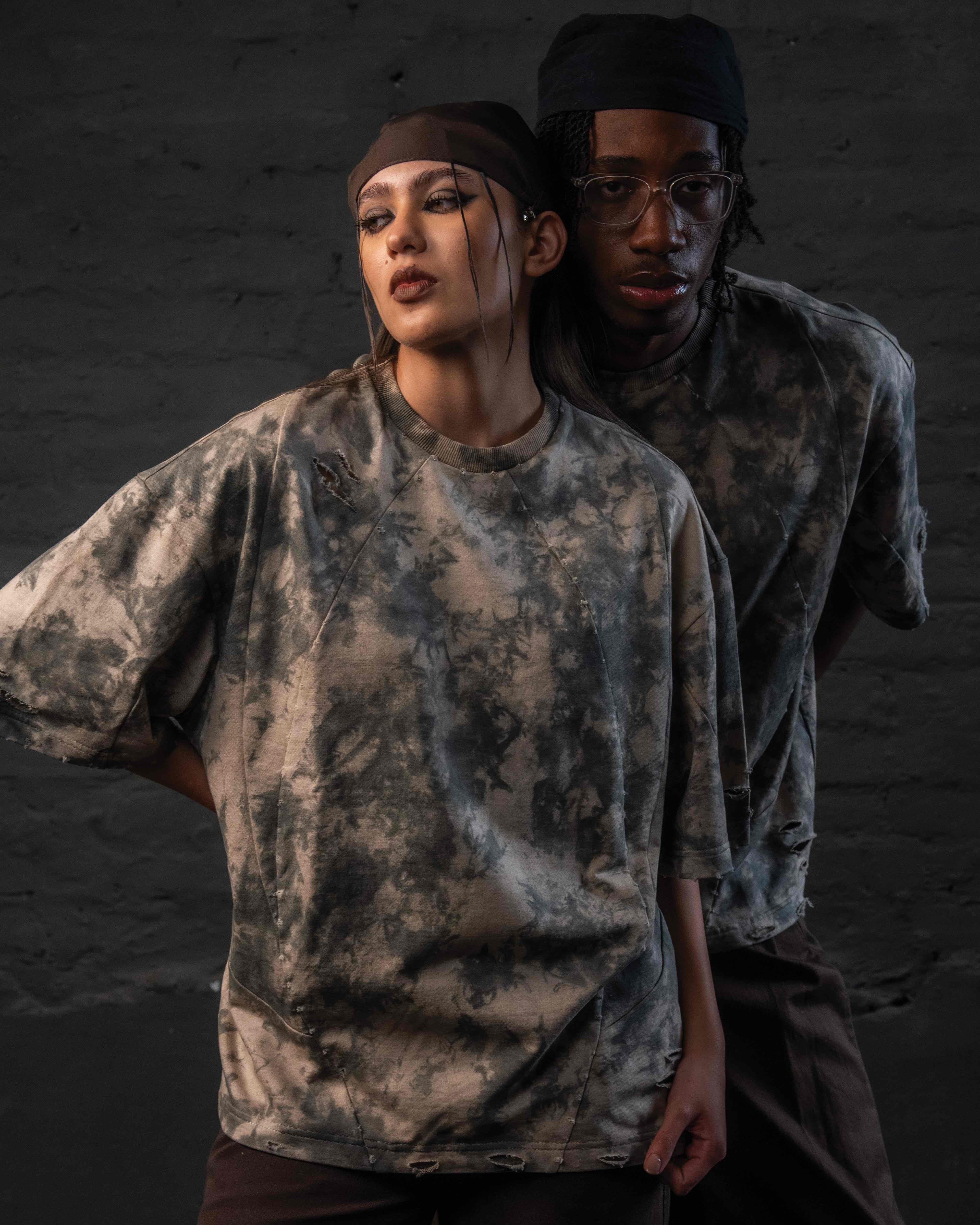 Editorial fashion pose featuring GRAINDUST RAW TEE luxury oversized grunge t shirt