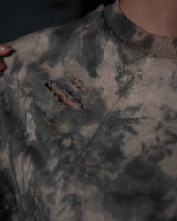 Hand distressed rip detail on GRAINDUST RAW TEE acid wash oversized tee