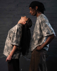 Side profile fit of GRAINDUST RAW TEE oversized distressed streetwear t shirt