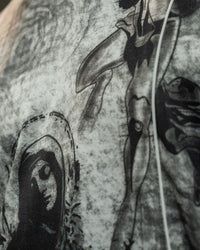 Close-up view of the premium illustrated print on the chest of an oversized lifestyle jersey