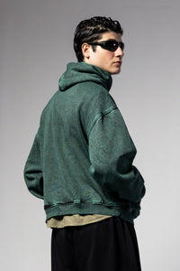 Green oversized acid washed hoodie with structured fit and contemporary streetwear silhouette