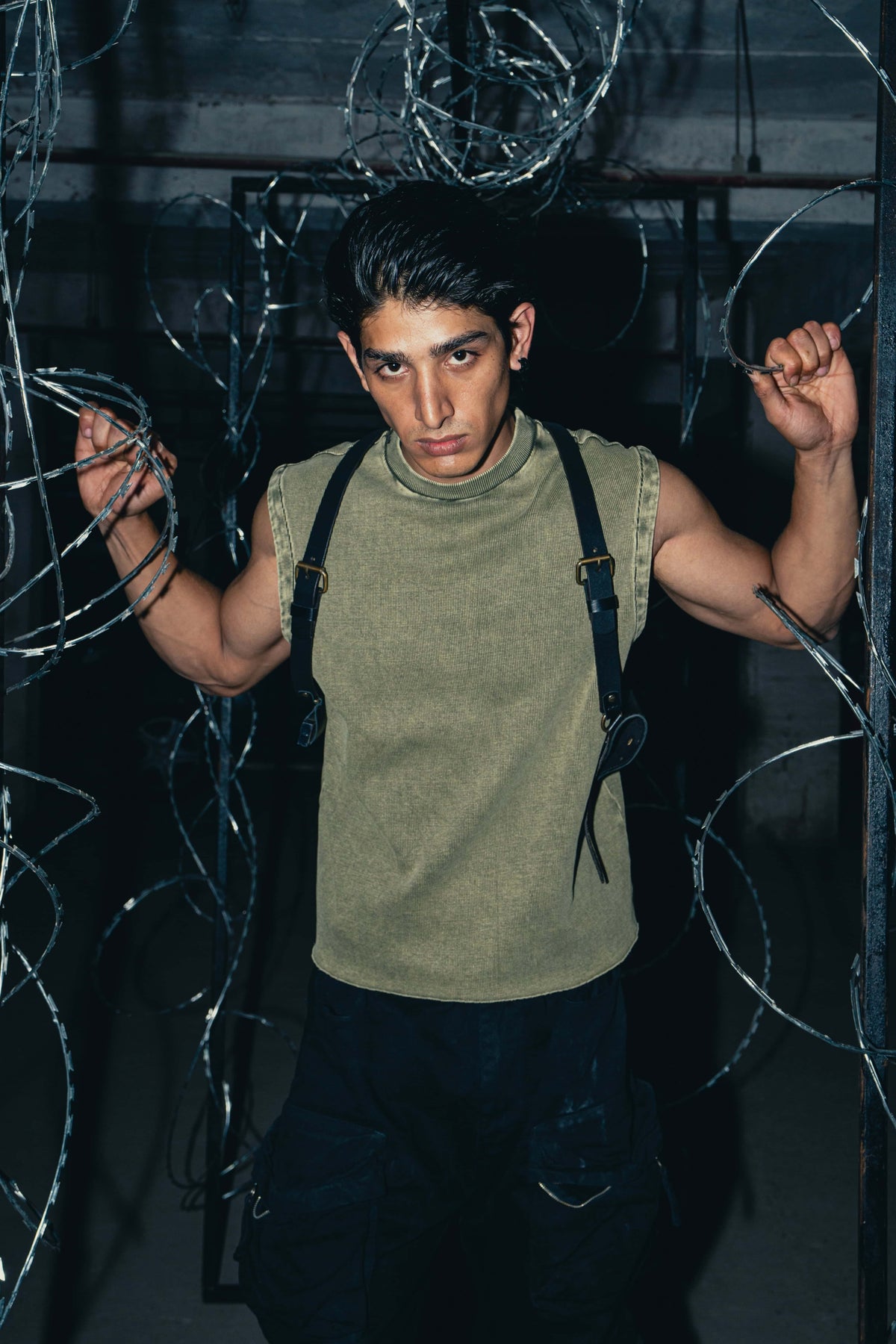 Olive green cotton tank top in a comfort fit, combining a relaxed feel with a stylish appearance for daily wear