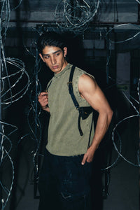 Olive green 100% cotton tank top designed with an extended fit for a modern, casual silhouette with extra room