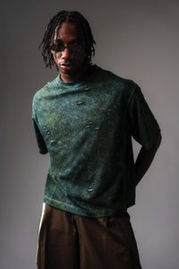 Front portrait view of GRN_ERR green acid wash oversized streetwear tee