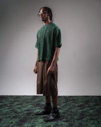 Side profile fit of GRN_ERR green oversized streetwear t shirt