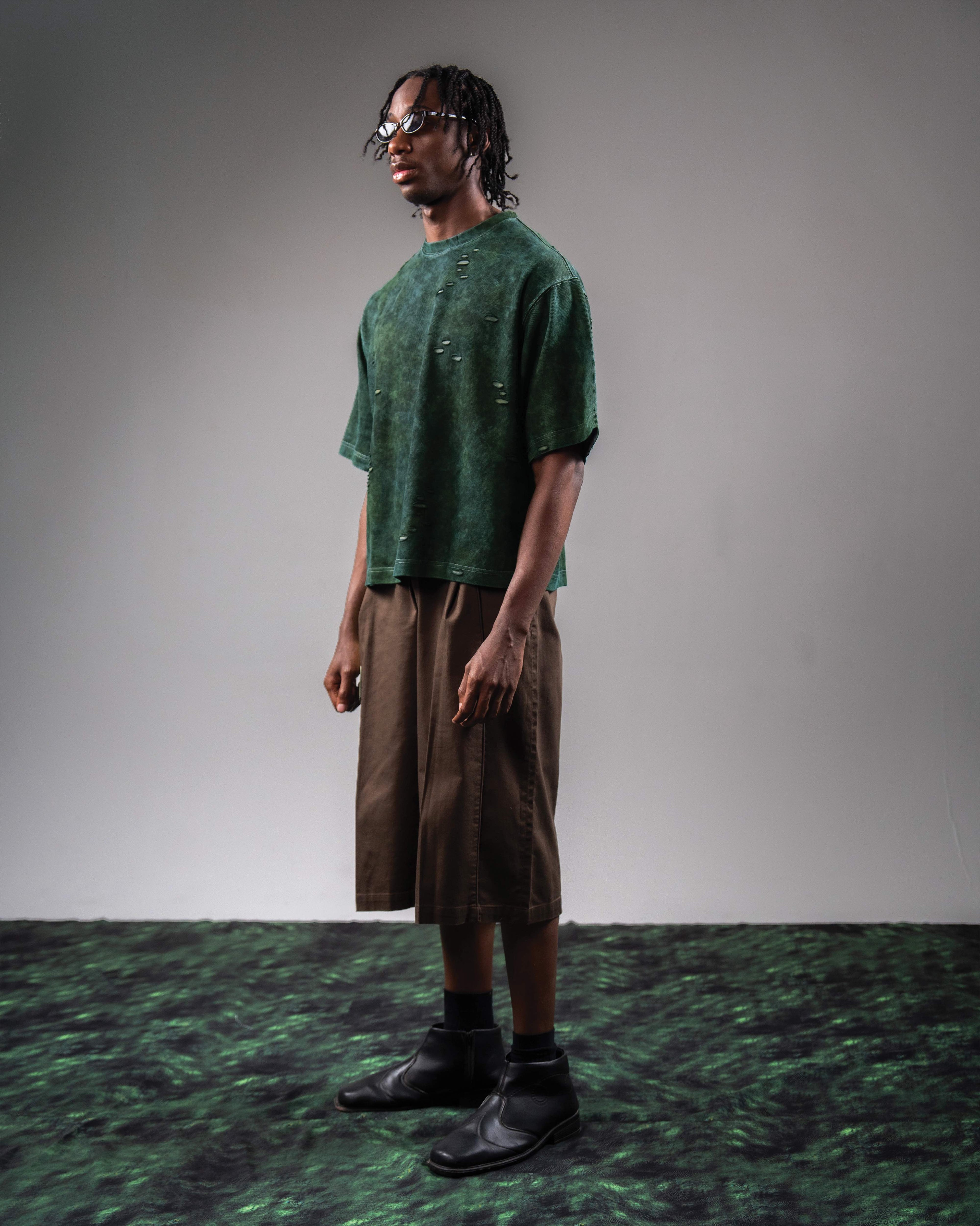 Side profile fit of GRN_ERR green oversized streetwear t shirt