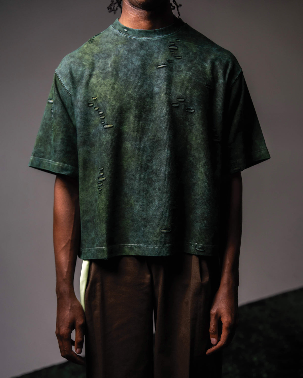 Full front fit look of GRN_ERR oversized green vintage wash t shirt
