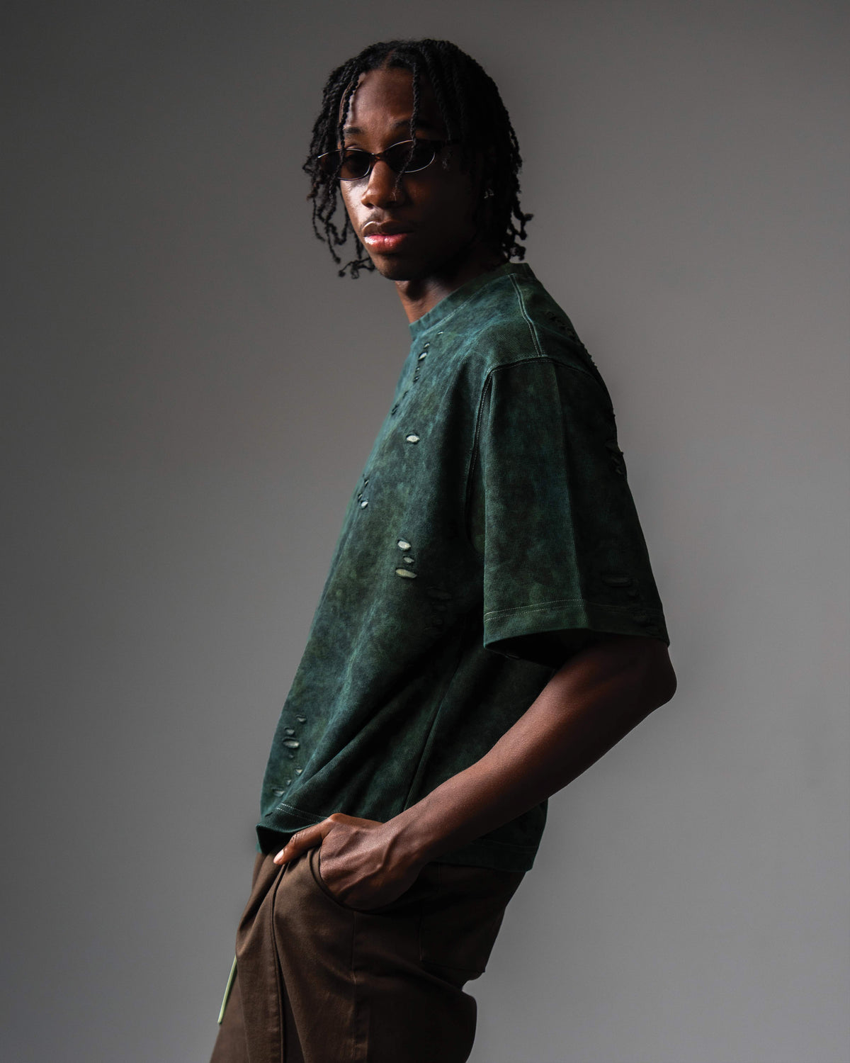 Unisex fashion streetwear shot featuring GRN_ERR oversized green t shirt