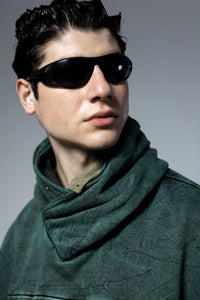 High neck green hoodie with premium stitching and modern streetwear finish