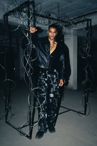 Modern oversized black croc leather jacket, offering a chic and stylish appearance for streetwear lovers
