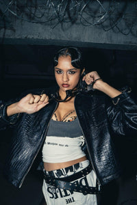 Structured oversized black croc leather jacket, combining bold design with a relaxed, comfortable fit