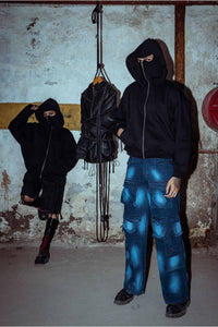 Luxe black cotton jacket with a textured design and relaxed fit, offering chic street fashion