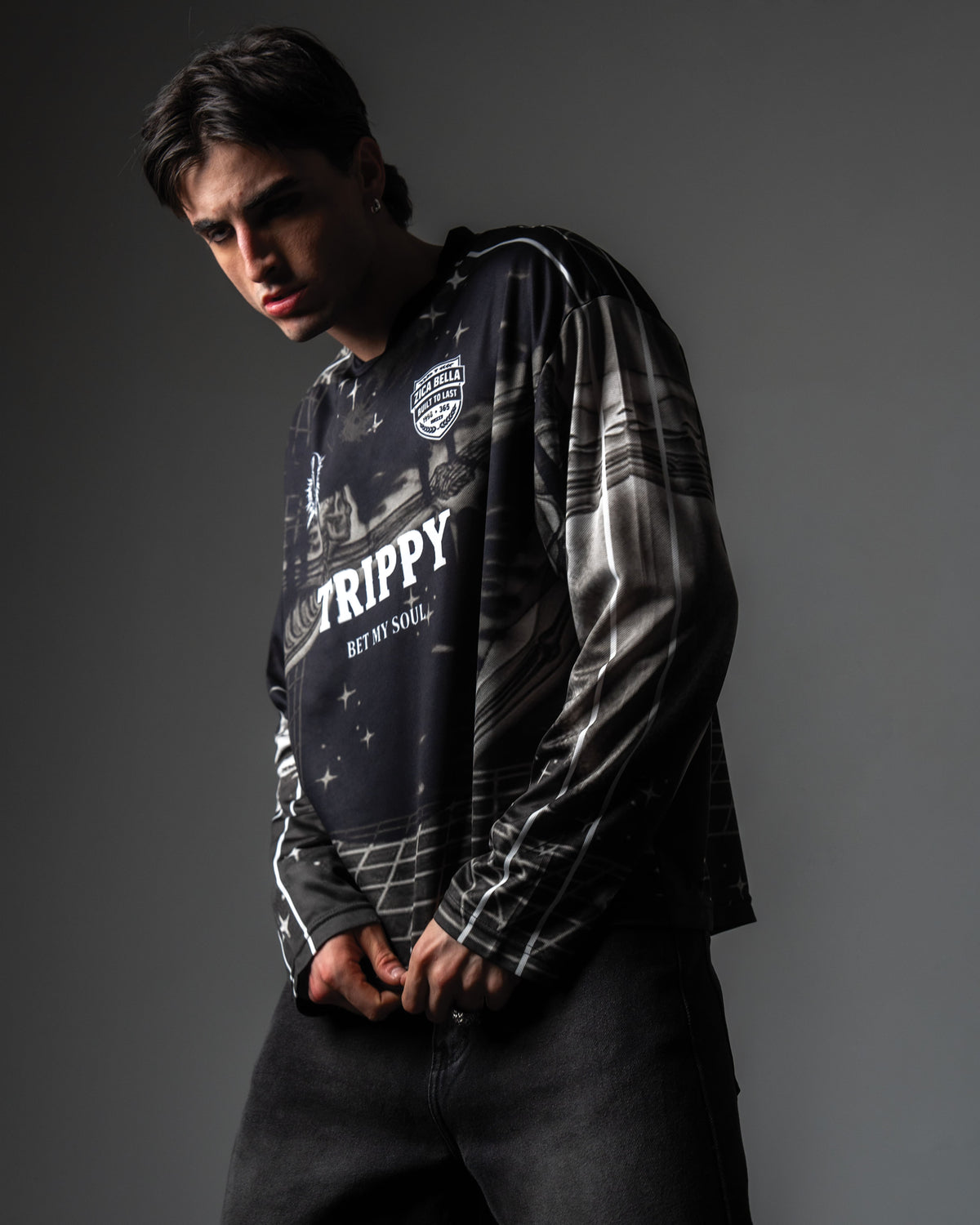 Studio model shot showing the heavy drape and texture of the TRPPY_22 long sleeve jersey