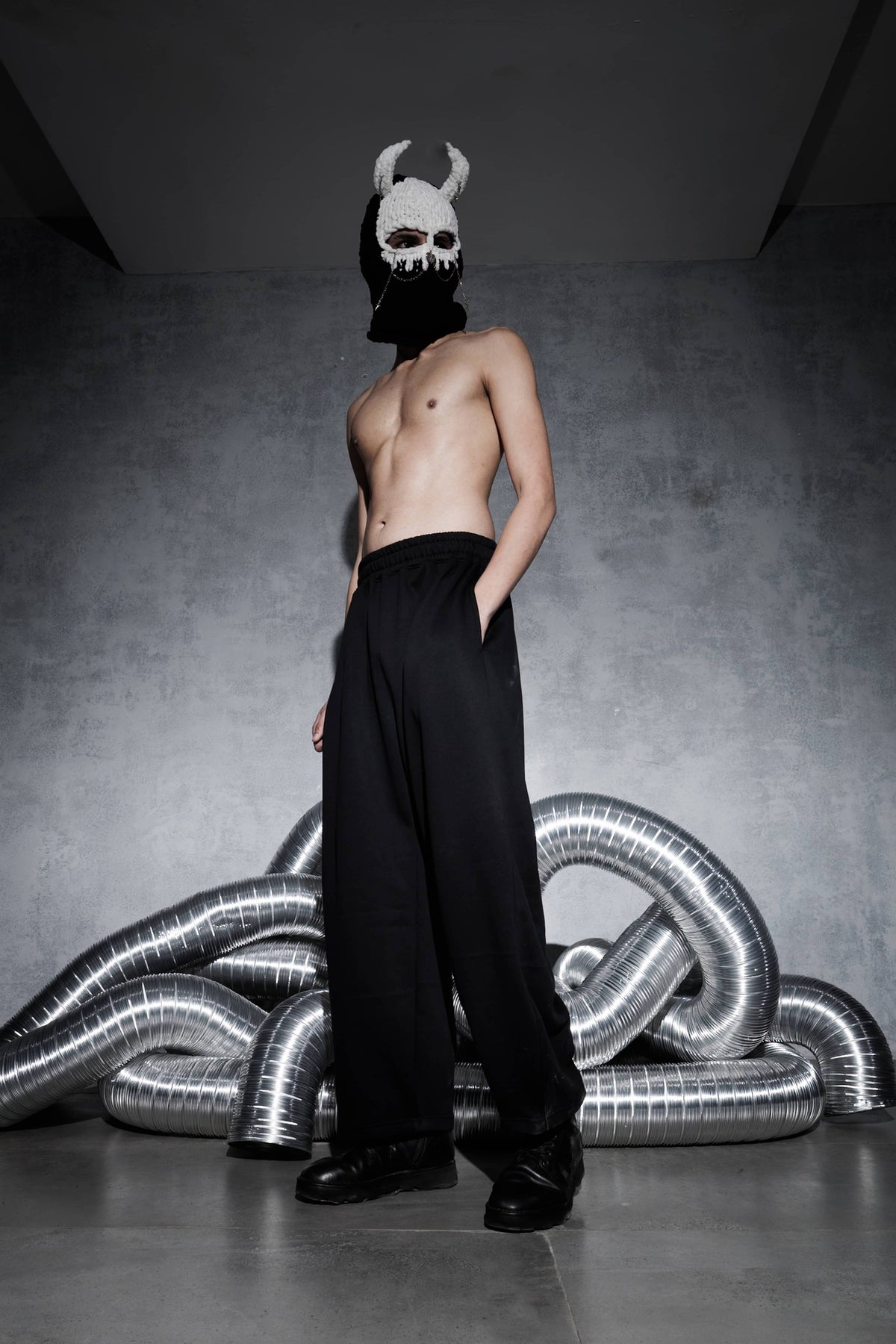 Premium black wide leg streetwear joggers with oversized fit for men high quality joggers styled in modern urban fashion look
