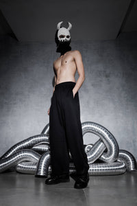 Premium black wide leg streetwear joggers with oversized fit for men high quality joggers styled in modern urban fashion look
