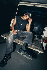 Charcoal cotton tank top with a modern fit, offering a relaxed streetwear look that’s perfect for layering or casual outings