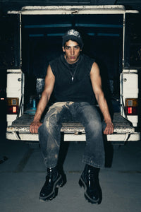Slim-fit charcoal cotton tank top with a graphic design, tailored for streetwear fashion, delivering a stylish and edgy look
