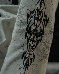 Tribal gothic sleeve graphic on a relaxed unisex full sleeve t-shirt