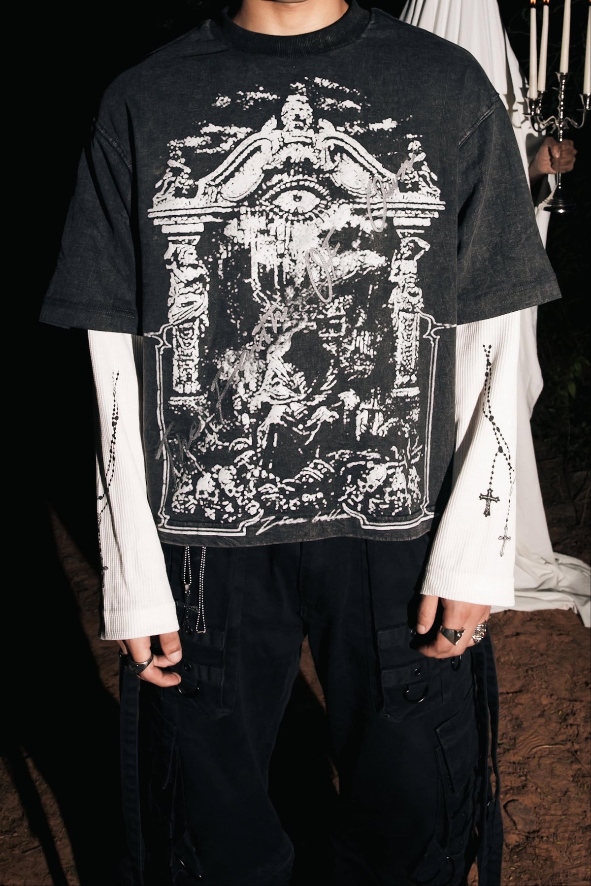 Black cotton graphic streetwear t-shirt featuring gothic artwork, styled for modern urban fashion