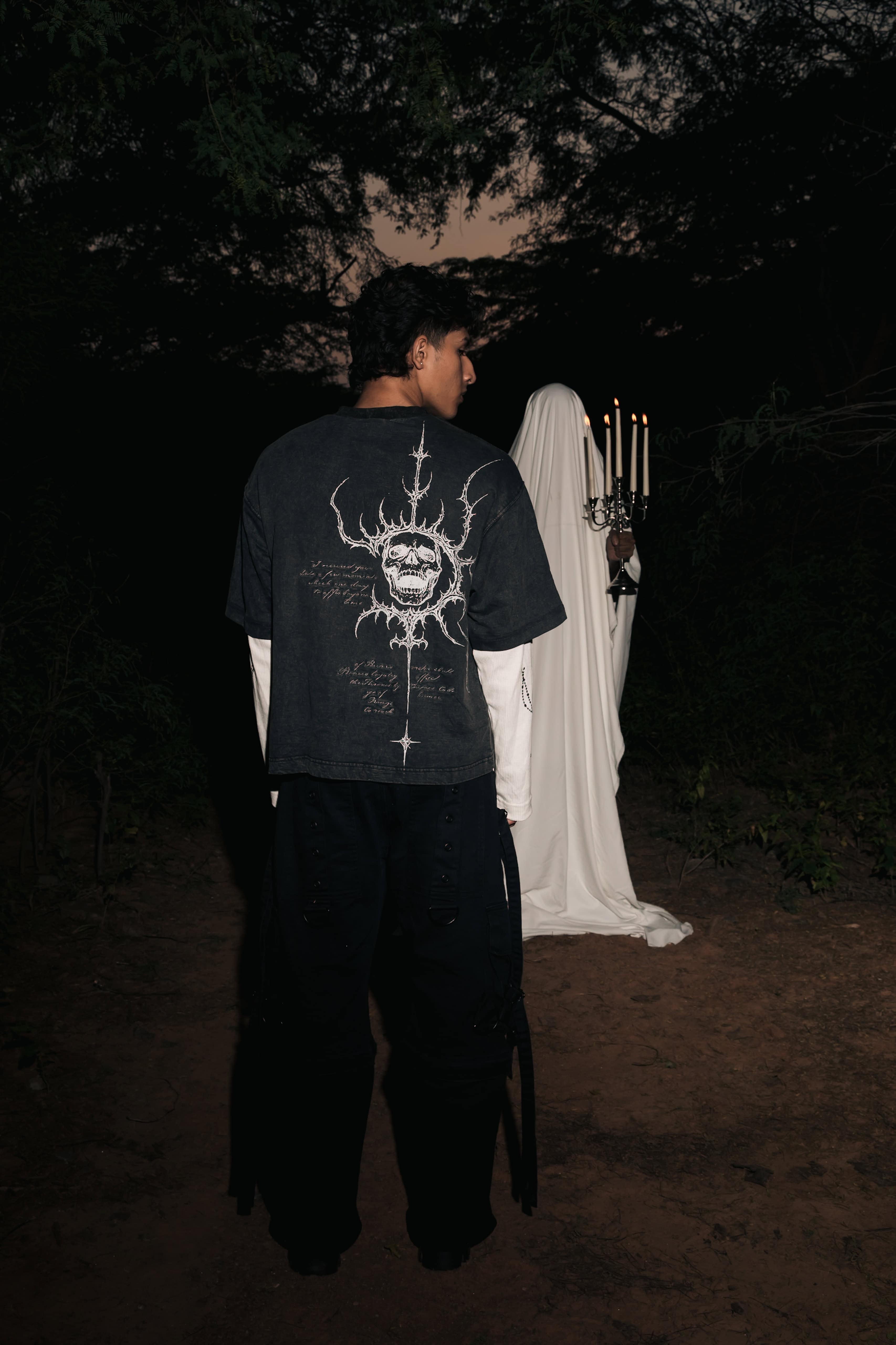 premium streetwear black cotton t-shirt with symbolic graphic print, designed for statement outfits