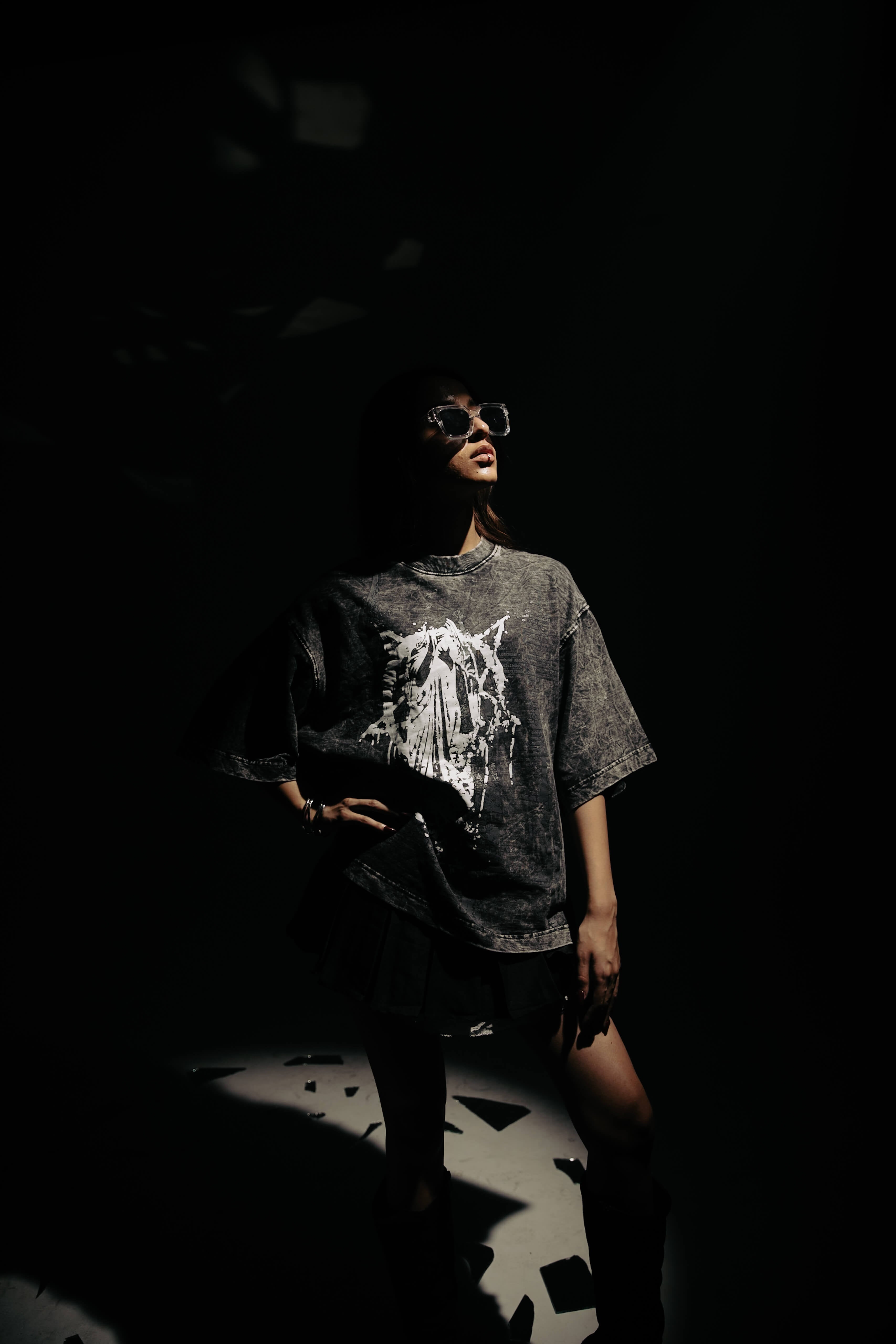 Dark grey raw graphic cotton t-shirt designed with an oversized streetwear silhouette
