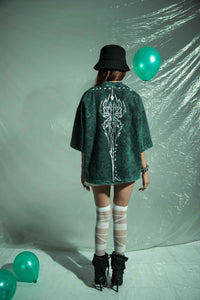 Urban oversized green cotton graphic t shirt inspired by street culture