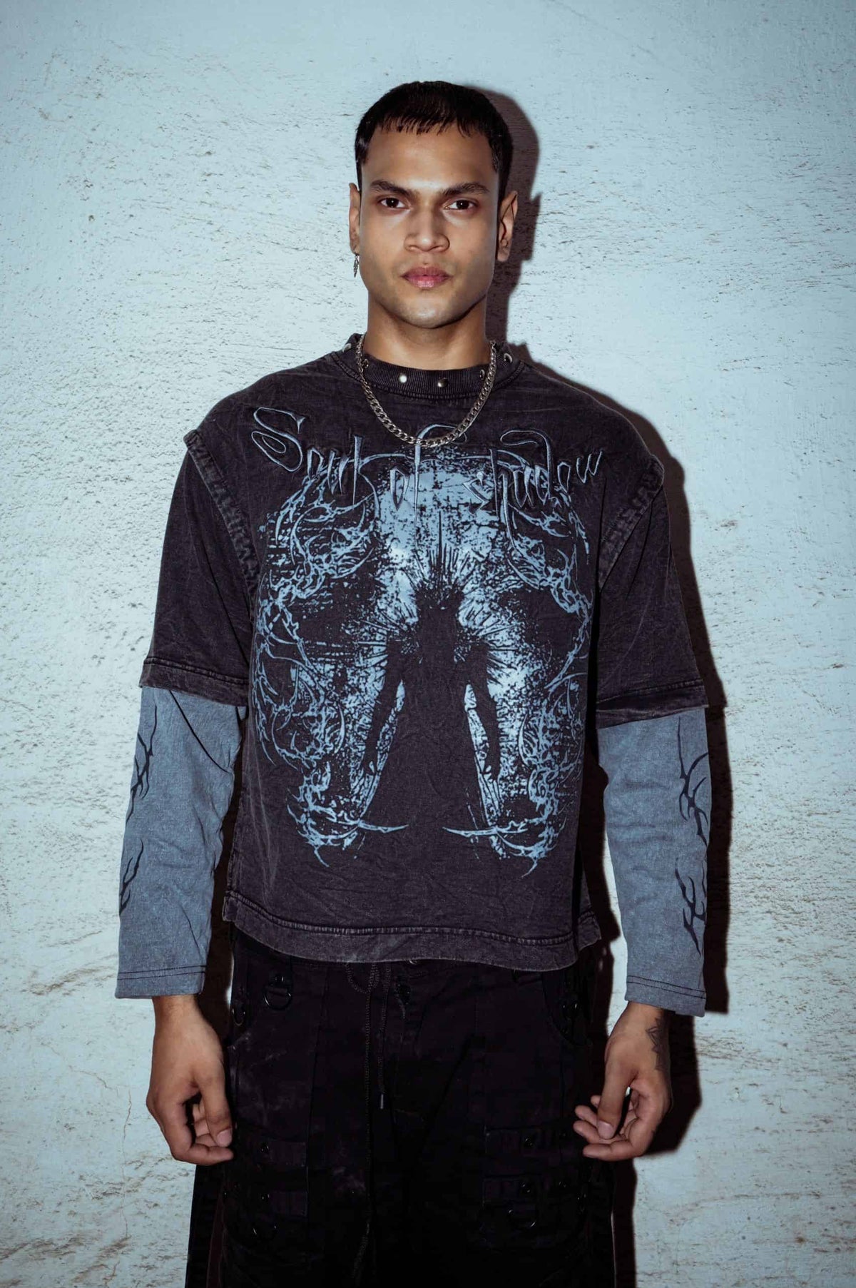 Graphic detail T-shirt made from premium cotton, relaxed fit, featuring a bold print on washed black fabric