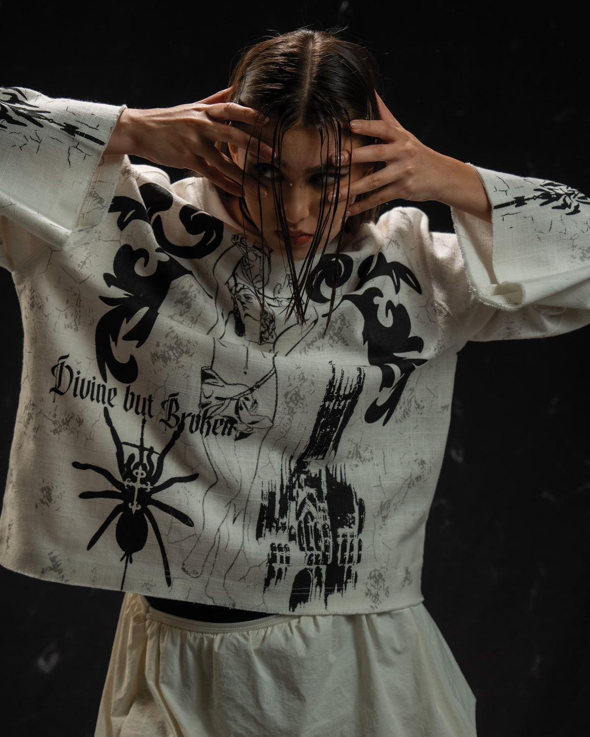 Women's gothic streetwear outfit featuring a relaxed oversized full sleeve t-shirt and alternative fashion styling