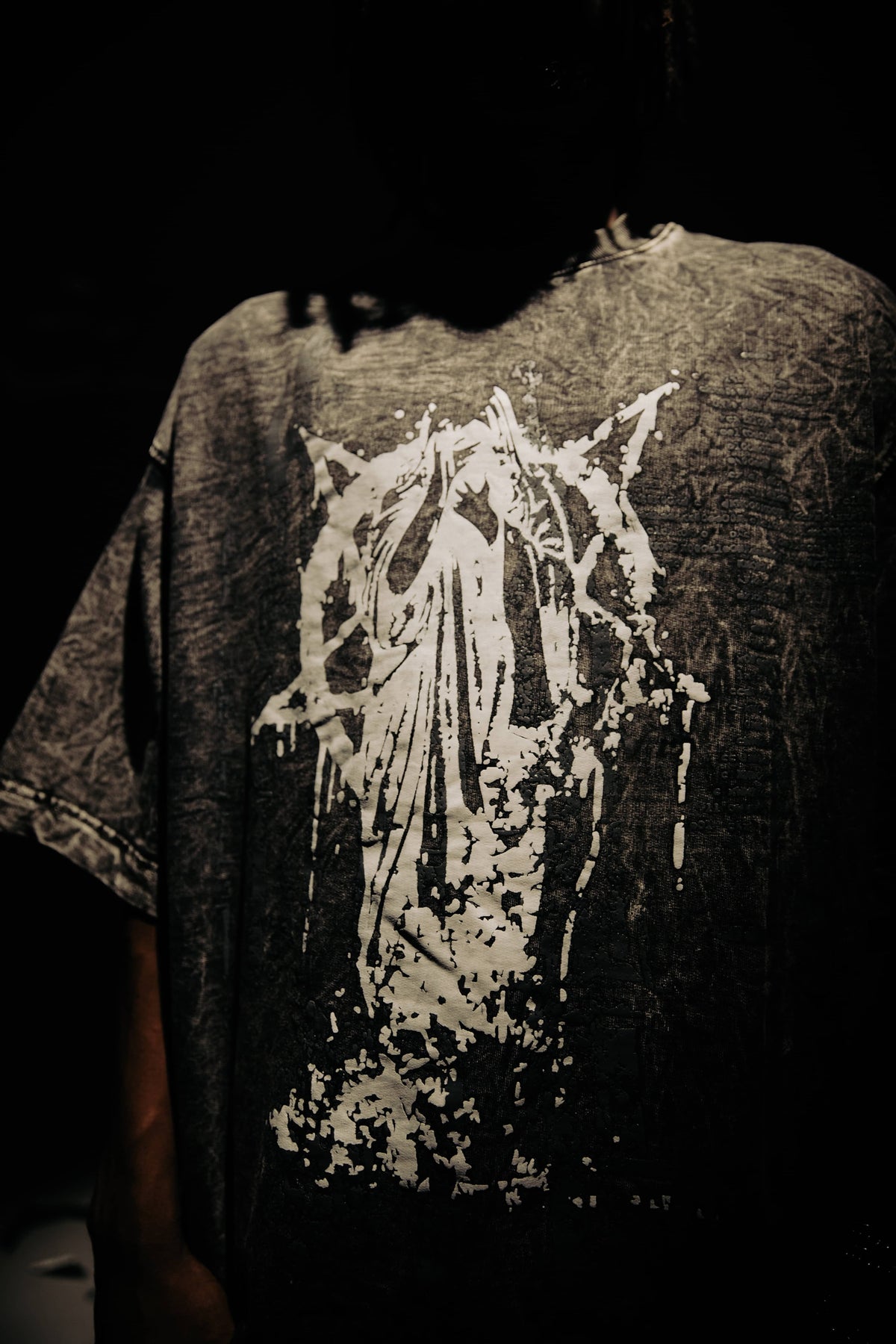 Acid Wash Graphic Cotton T-Shirt in Black, featuring a unique graphic design. Oversized fit with a distressed acid-wash effect for an edgy streetwear look by zica bella