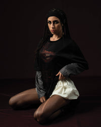 Zica Bella Bloodzic Jersey 01 black oversized streetwear jersey with red graphic styled on female model in editorial fashion pose