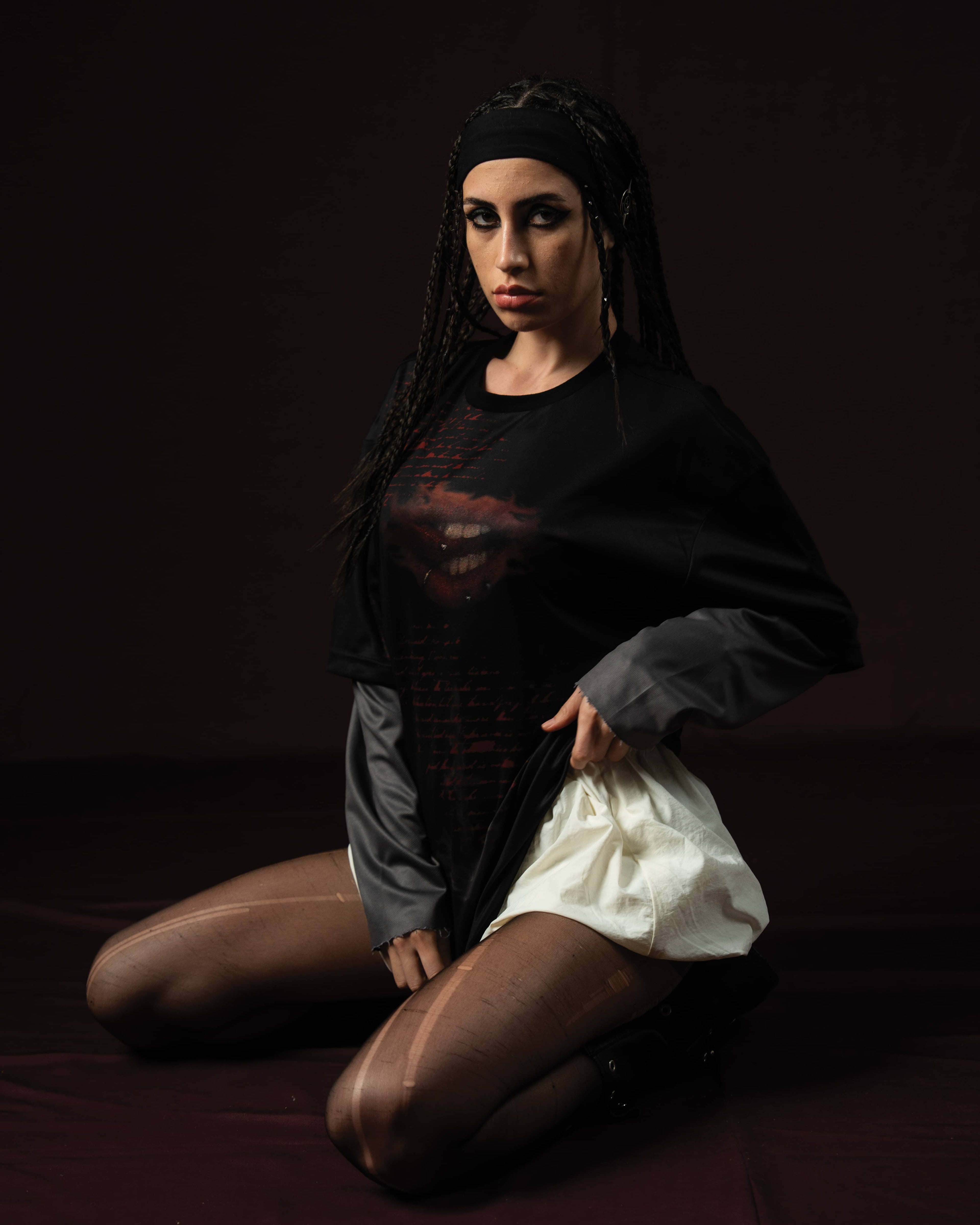 Zica Bella Bloodzic Jersey 01 black oversized streetwear jersey with red graphic styled on female model in editorial fashion pose