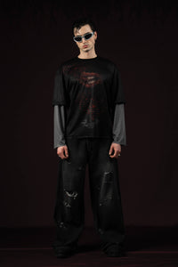 Zica Bella Bloodzic Jersey 01 black oversized streetwear jersey with red glitch graphic worn by male model portrait front view