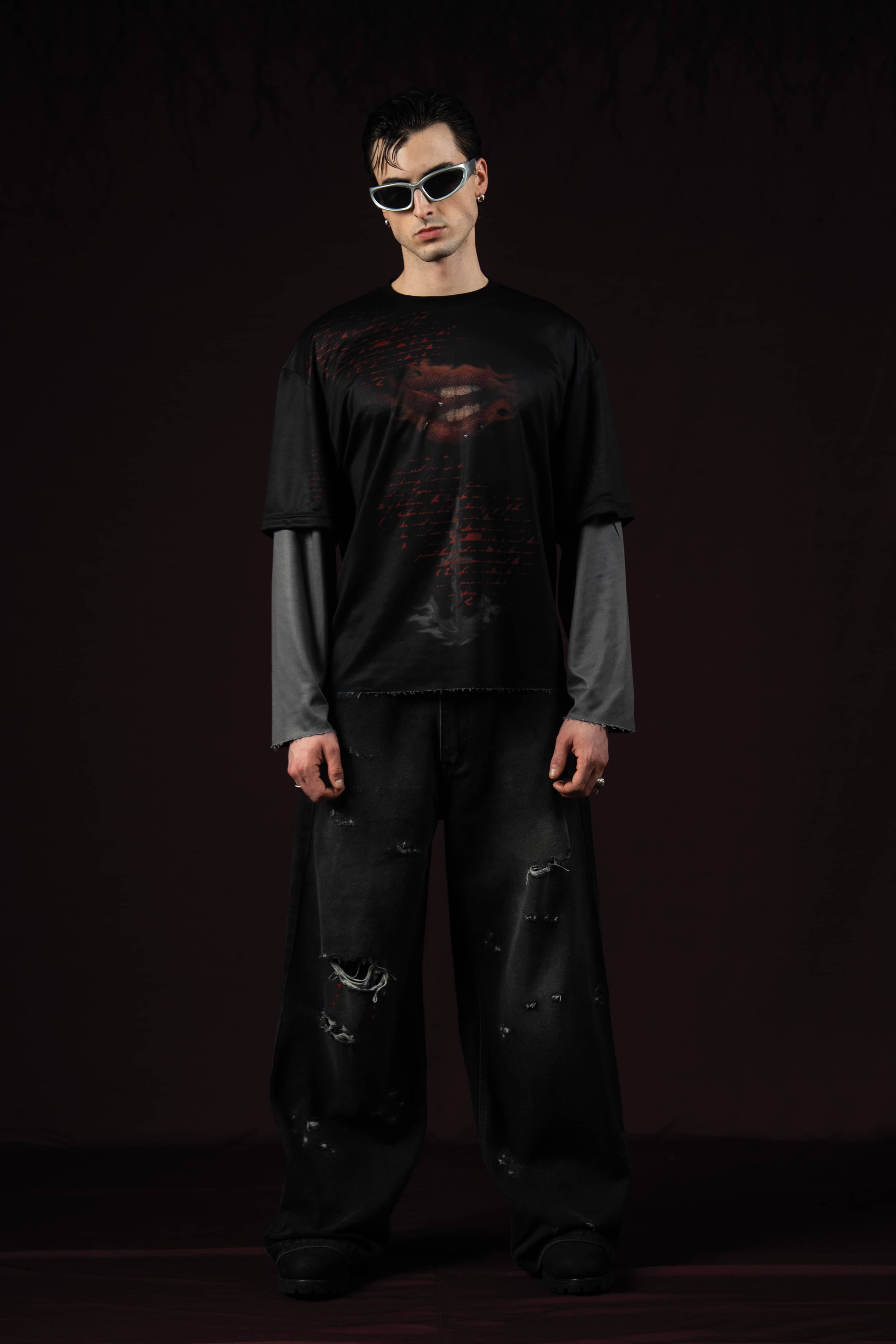 Zica Bella Bloodzic Jersey 01 black oversized streetwear jersey with red glitch graphic worn by male model portrait front view
