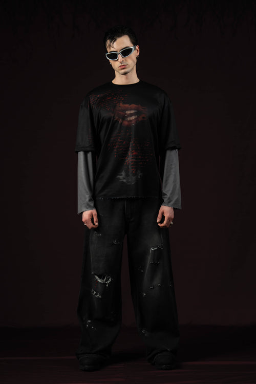 Zica Bella Bloodzic Jersey 01 black oversized streetwear jersey with red glitch graphic worn by male model portrait front view